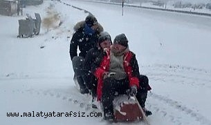 Malatya'da traktör arkasında karda 'sörf'